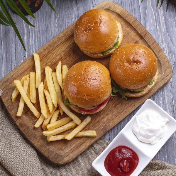 3 x top view burgers with french fries ketchup with mayonnaise tomatoes